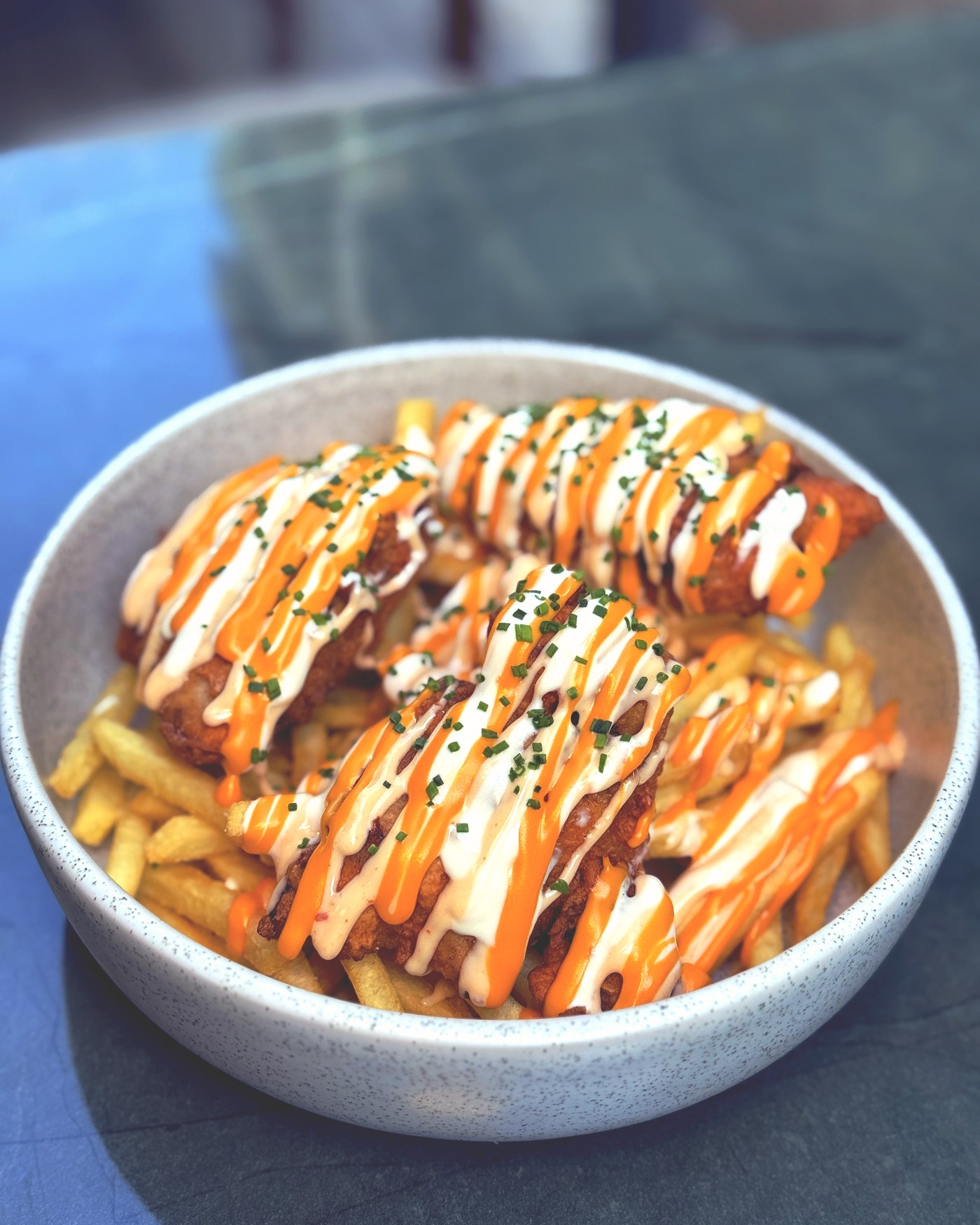 Loaded fries with creamy sauce